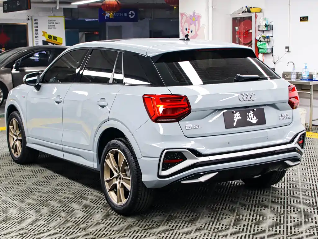 Audi Q2L 2022 — фото 20