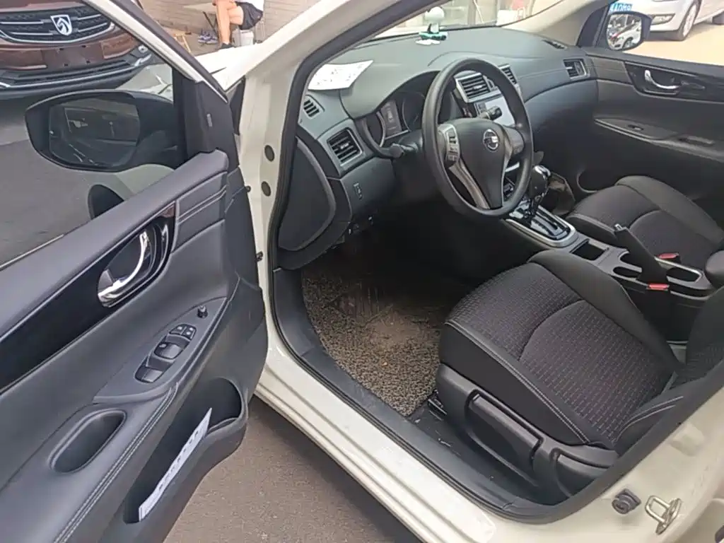 Nissan Tiida 2016 — фото 16
