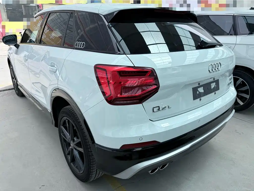 Audi Q2L 2021 — фото 17