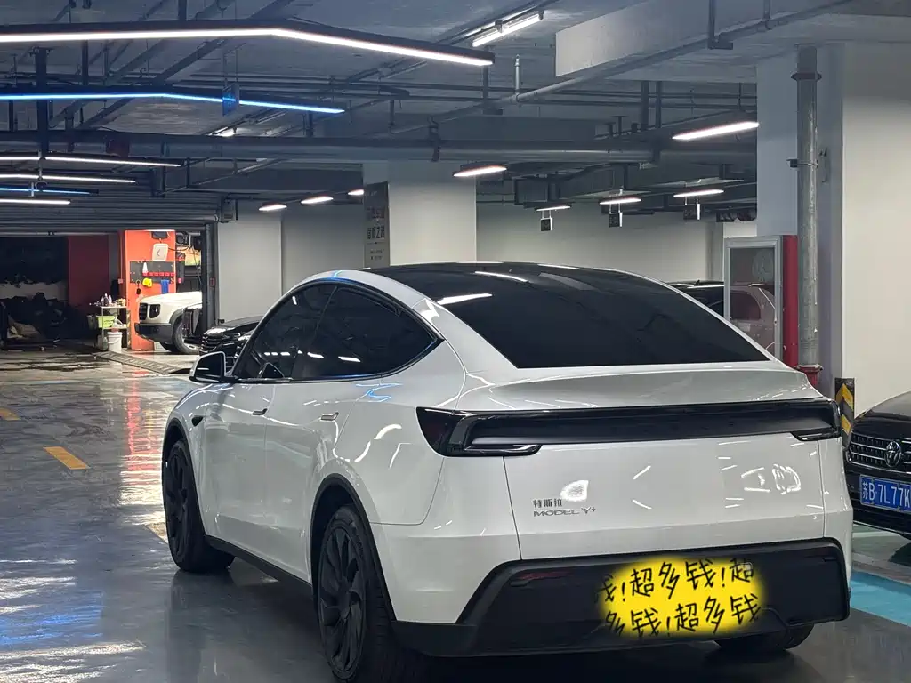 Tesla Model Y 2025 — фото 16