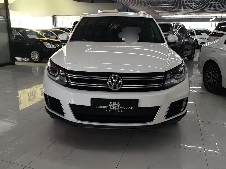 Volkswagen Tiguan 2014 — фото 2