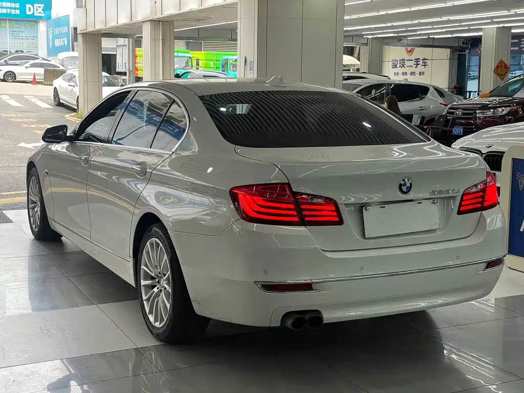 BMW 5 Series 2014 — фото 9