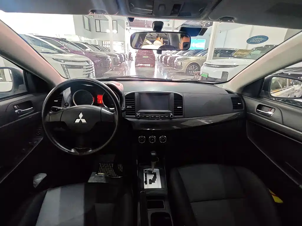 Mitsubishi Lancer EX 2013 — фото 11