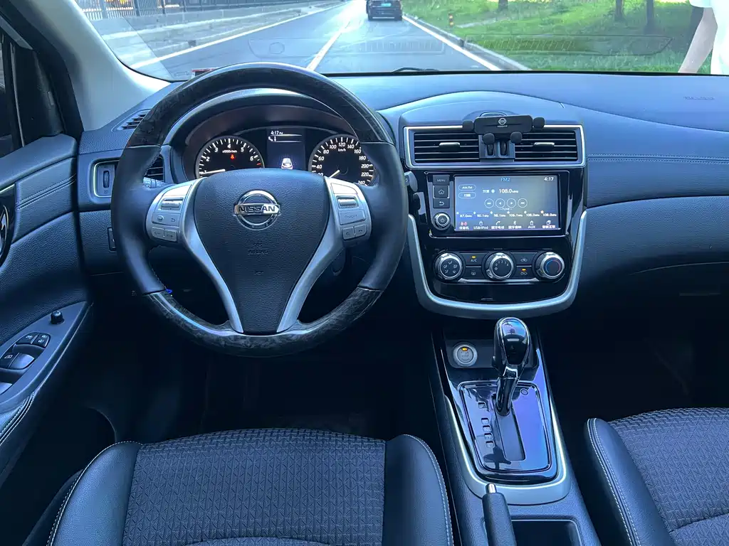 Nissan Tiida 2016 — фото 14