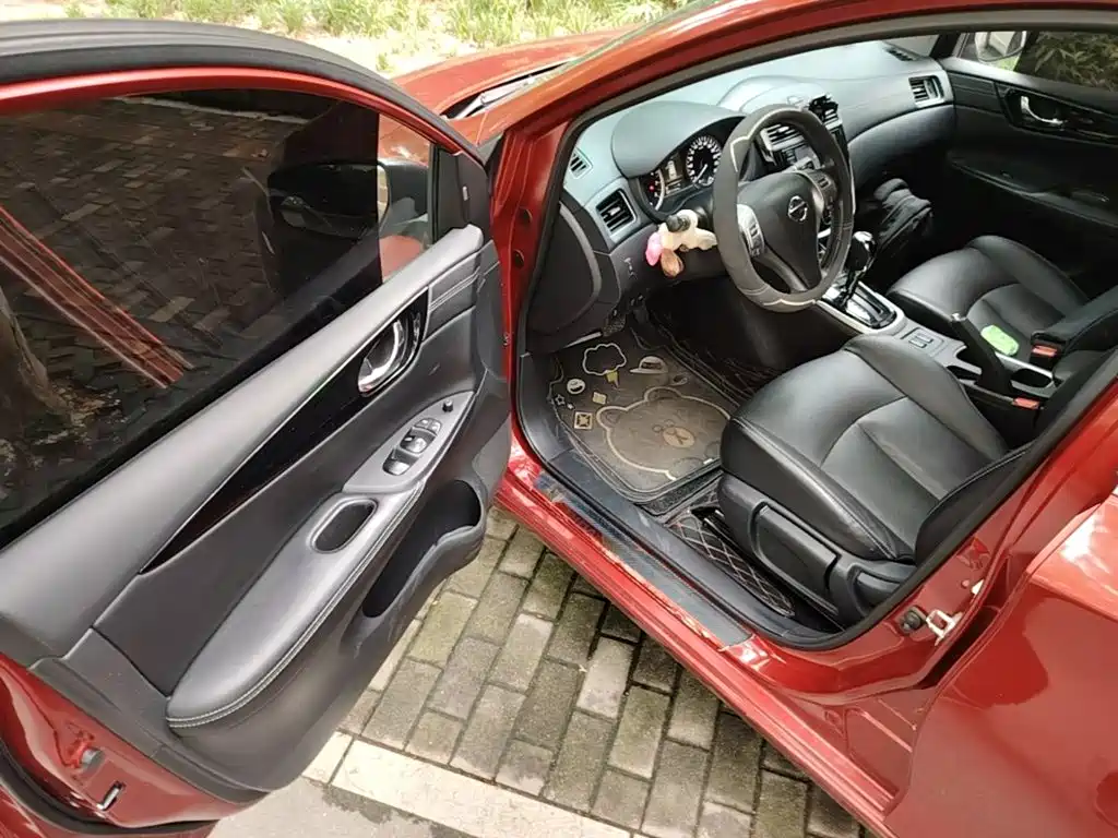 Nissan Tiida 2018 — фото 16