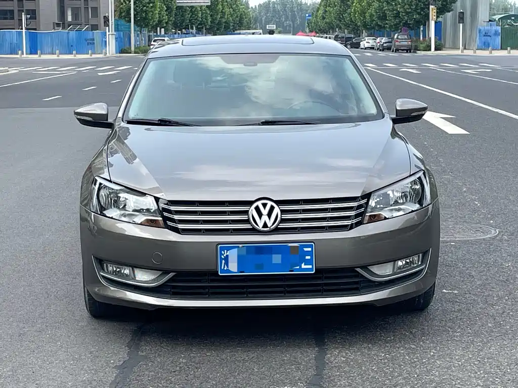 Volkswagen Passat 2014 — фото 2