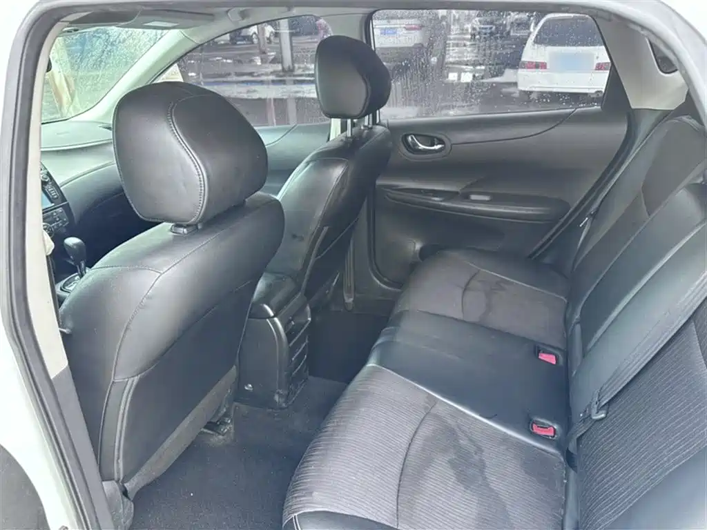 Nissan Tiida 2015 — фото 16