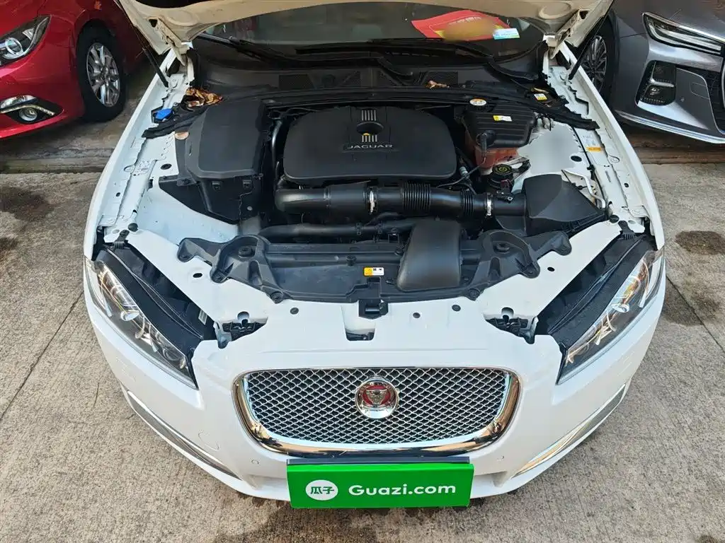 Jaguar XF 2015 — фото 20