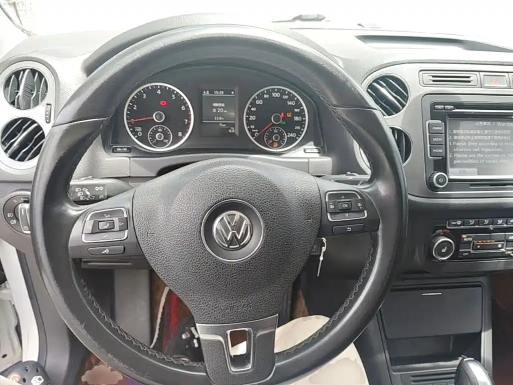 Volkswagen Tiguan 2014 — фото 11
