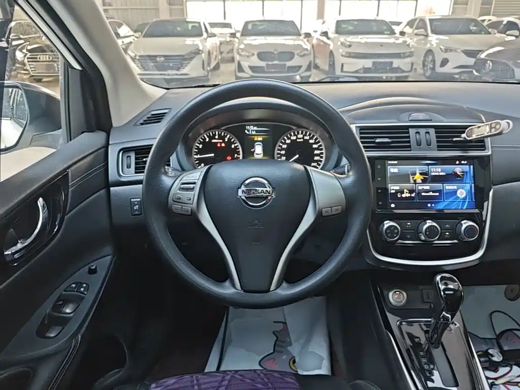 Nissan Tiida 2019 — фото 11