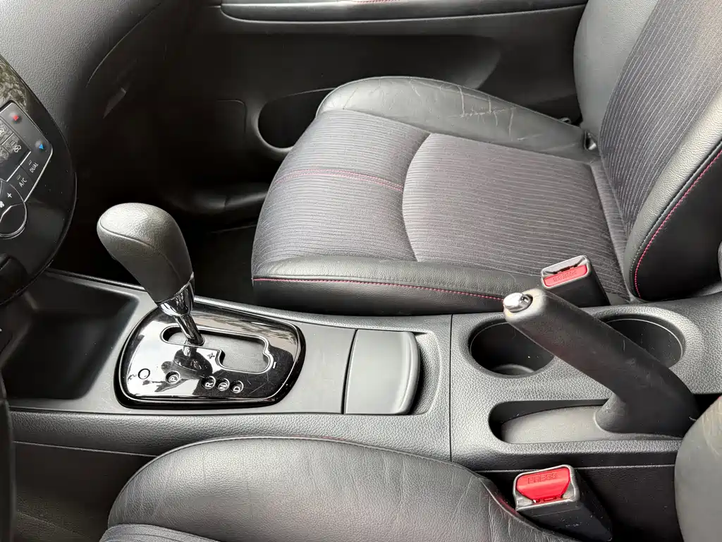 Nissan Tiida 2013 — фото 13