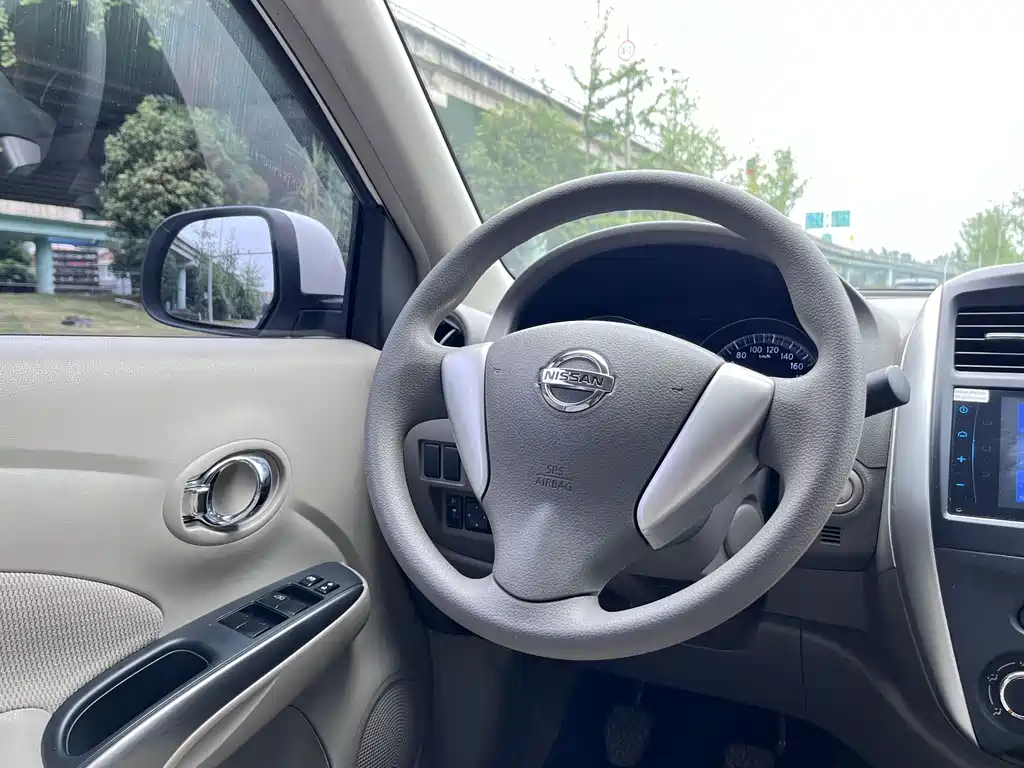 Nissan Sunny 2014 — фото 10
