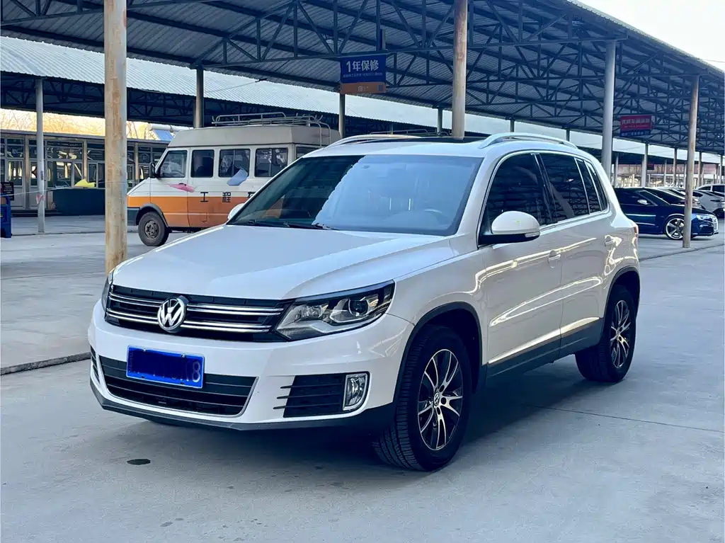 Volkswagen Tiguan 2014 — фото 1