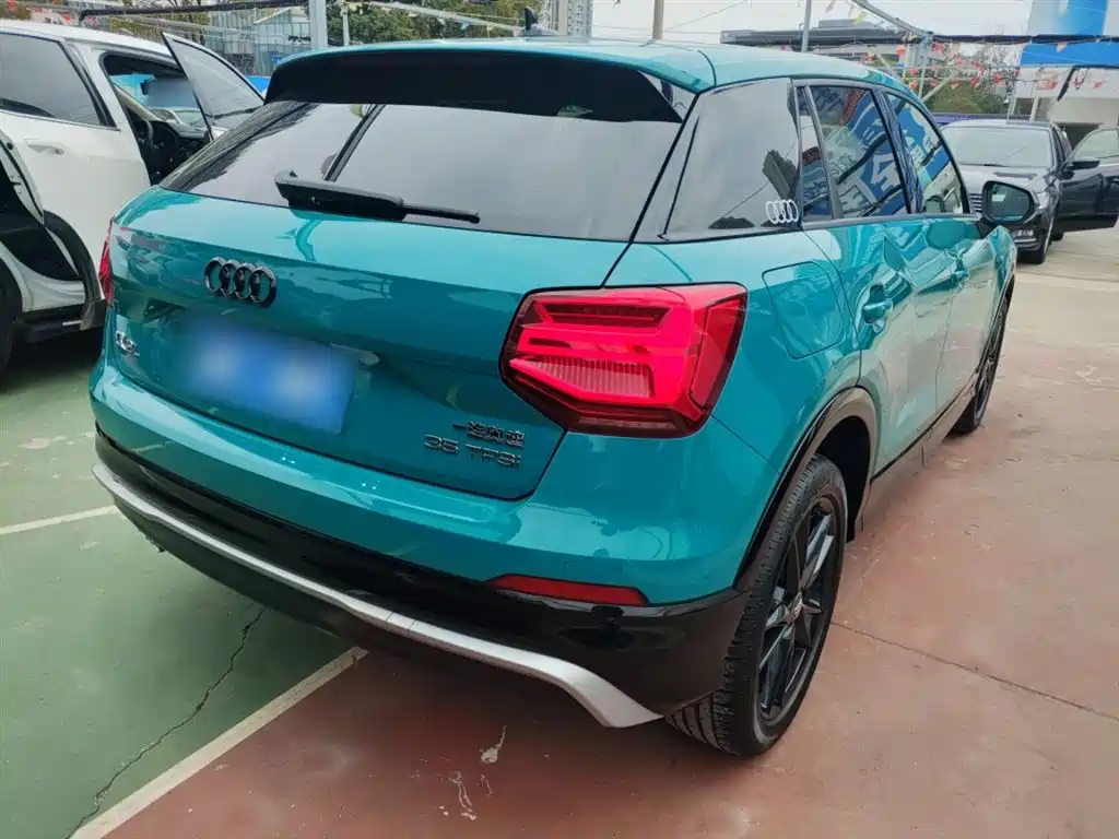 Audi Q2L 2021 — фото 7