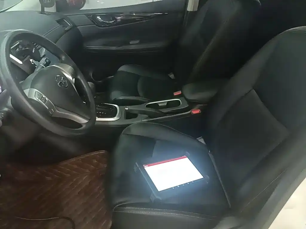 Nissan Tiida 2018 — фото 15