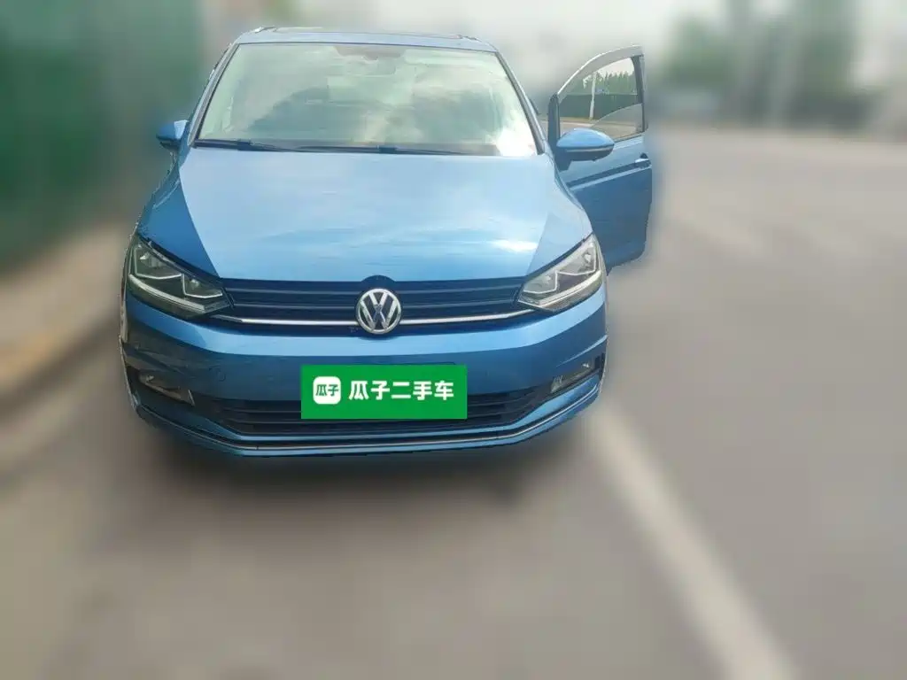 Volkswagen Touran 2018 — фото 24