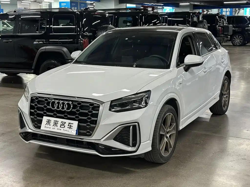 Audi Q2L 2022 — фото 1