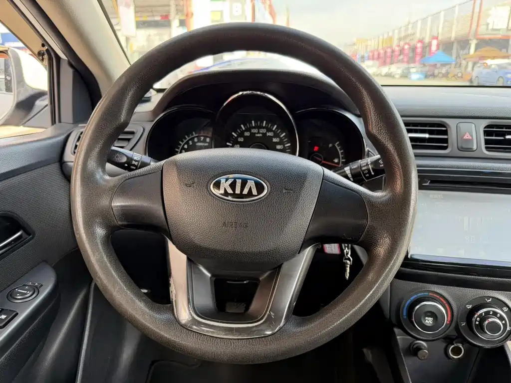 Kia K2 2013 — фото 21