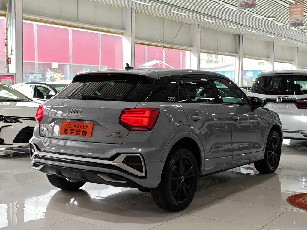 Audi Q2L 2022 — фото 15