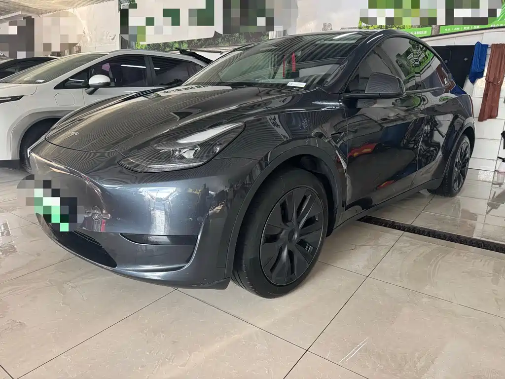 Tesla Model Y 2025 — фото 1