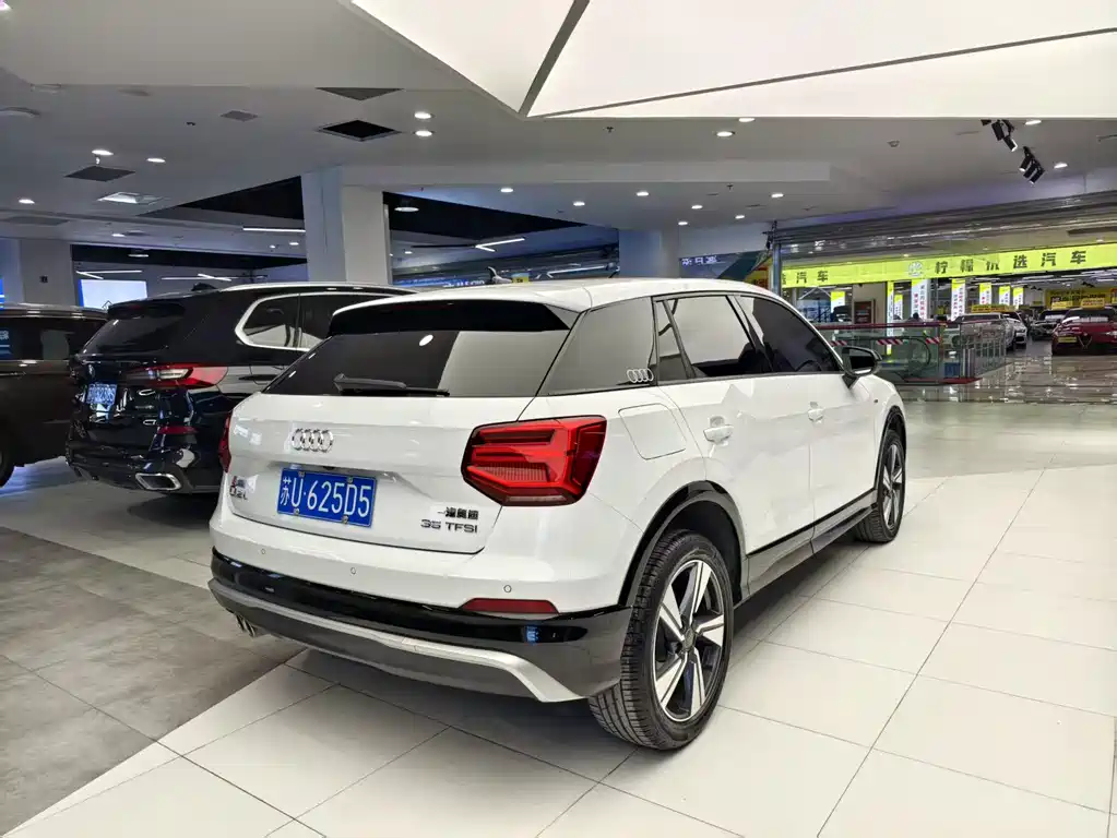 Audi Q2L 2021 — фото 17