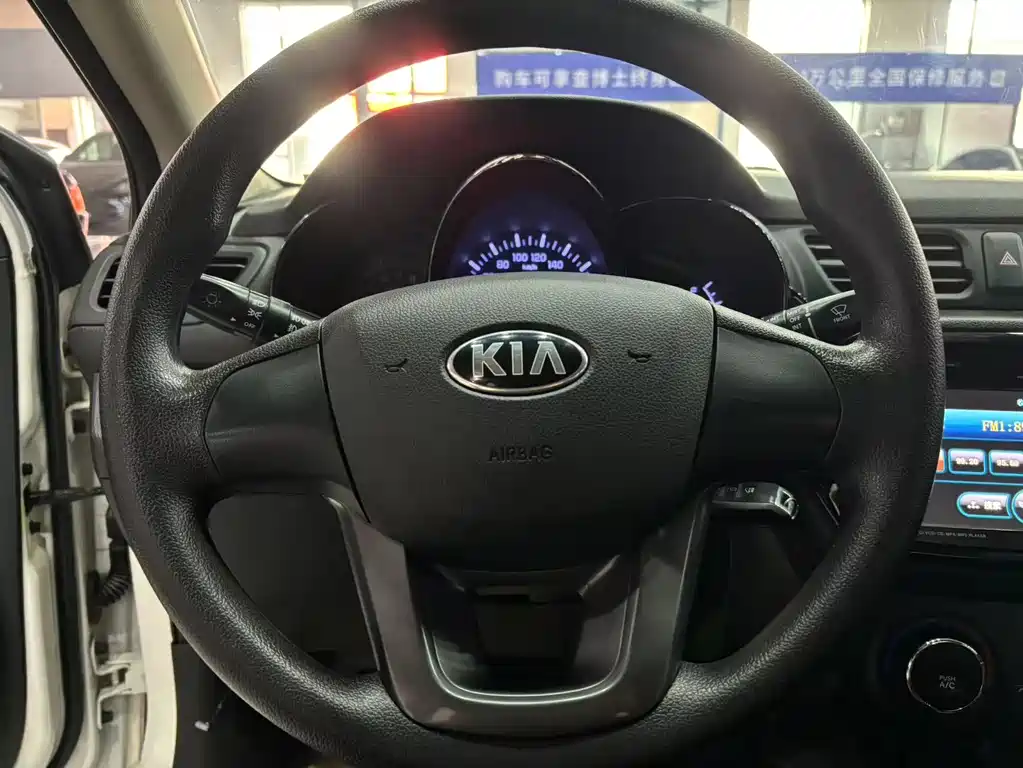 Kia K2 2012 — фото 12