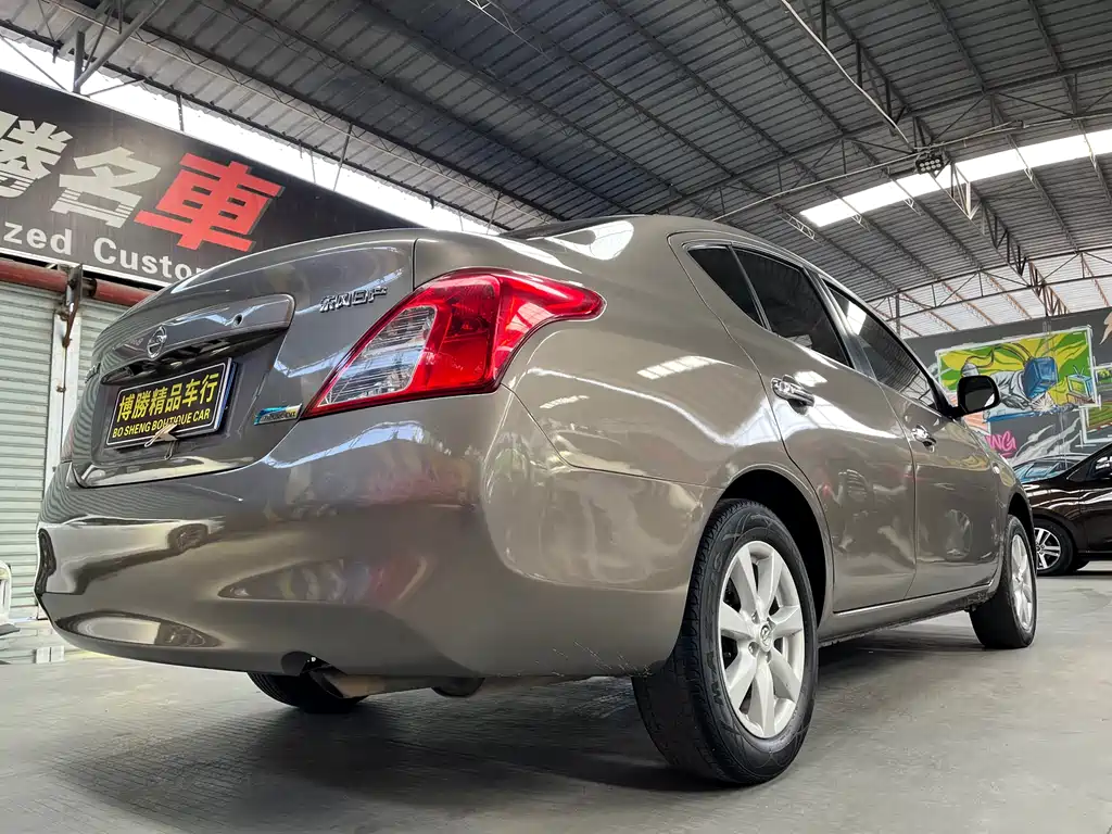 Nissan Sunny 2011 — фото 10