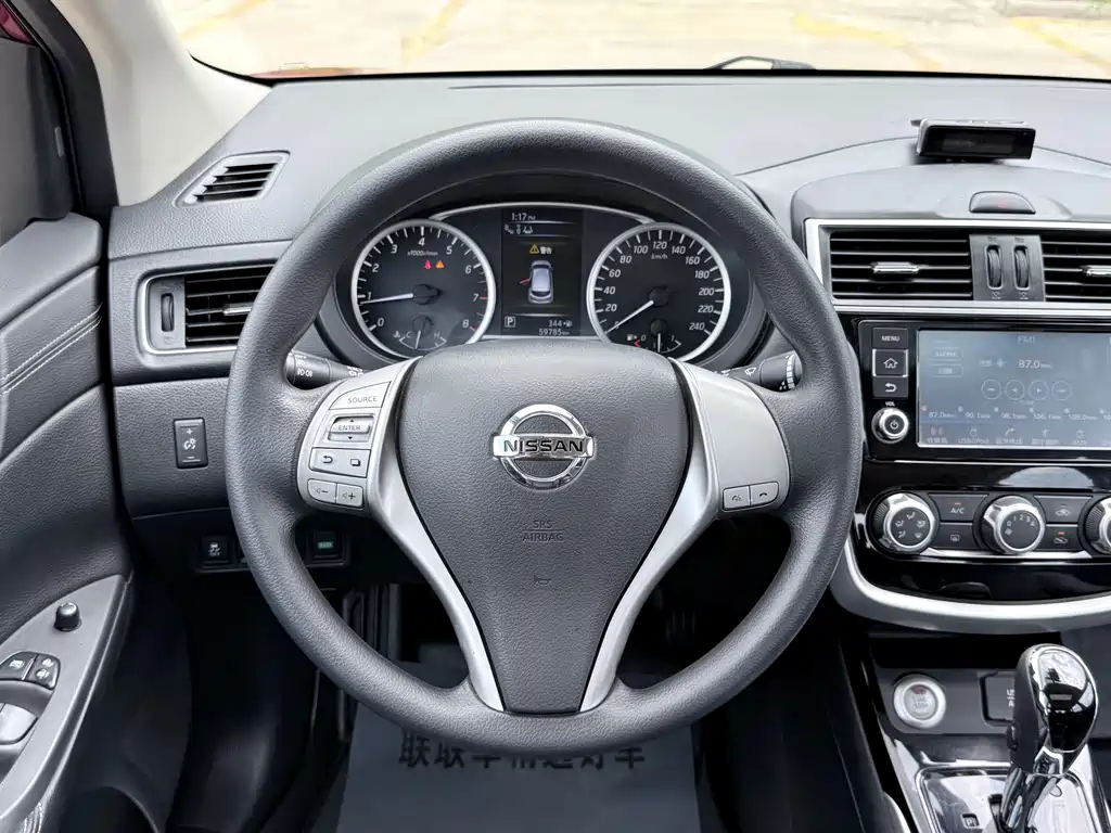 Nissan Tiida 2016 — фото 14