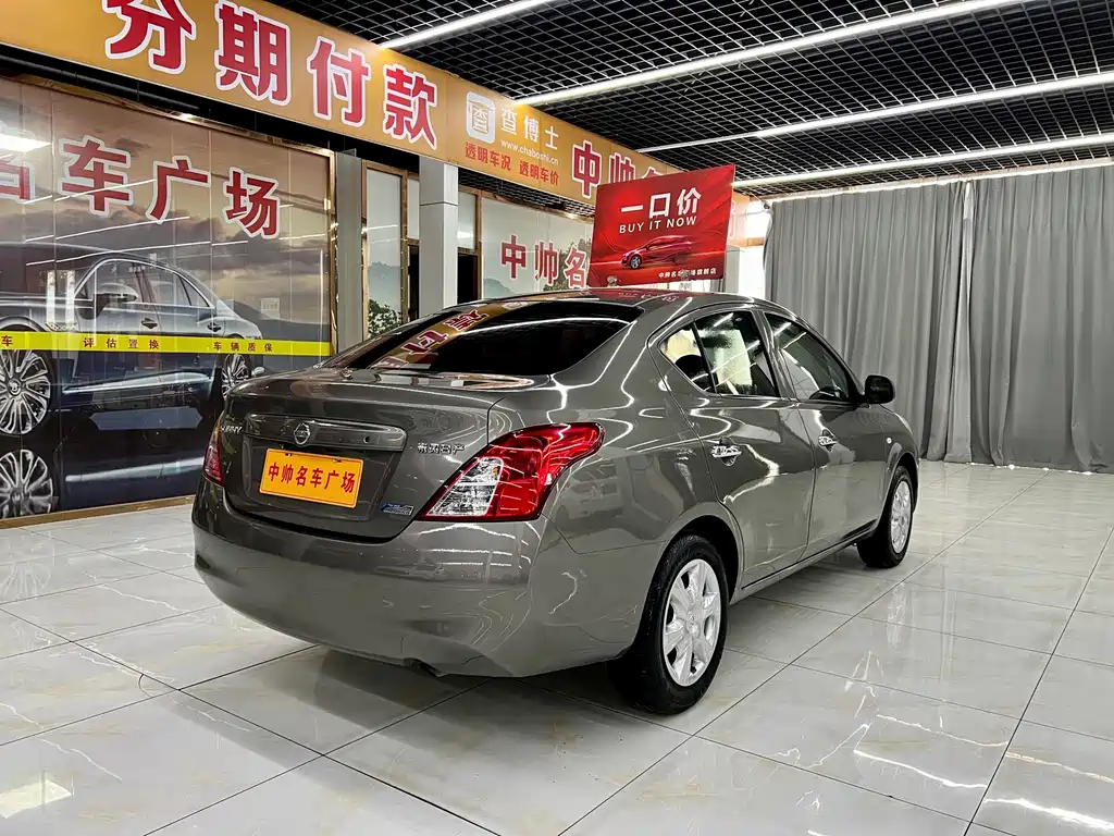 Nissan Sunny 2011 — фото 6