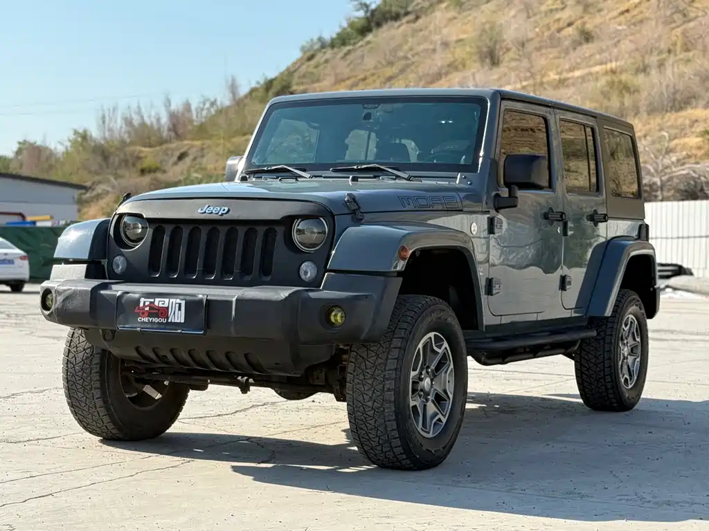 Jeep Wrangler 2014 — фото 1
