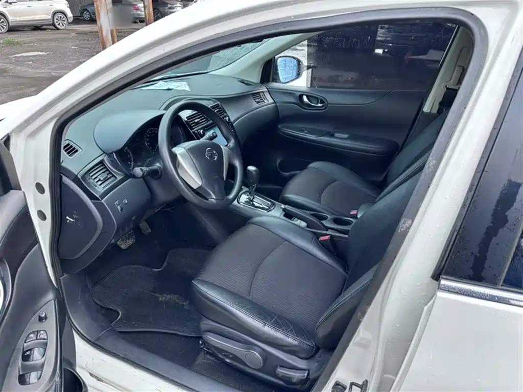 Nissan Tiida 2015 — фото 15