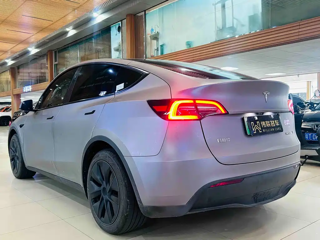 Tesla Model Y 2024 — фото 4