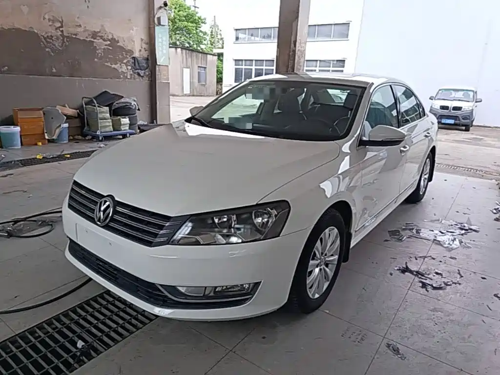 Volkswagen Passat 2014 — фото 2