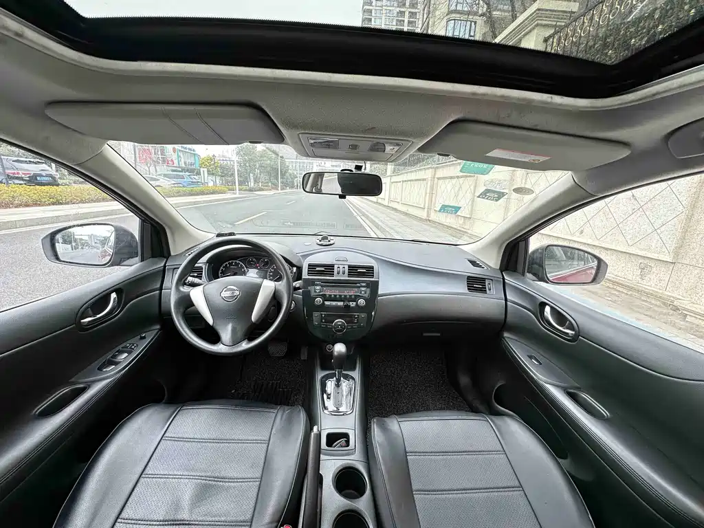 Nissan Tiida 2015 — фото 9