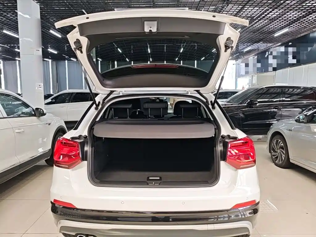 Audi Q2L 2021 — фото 19