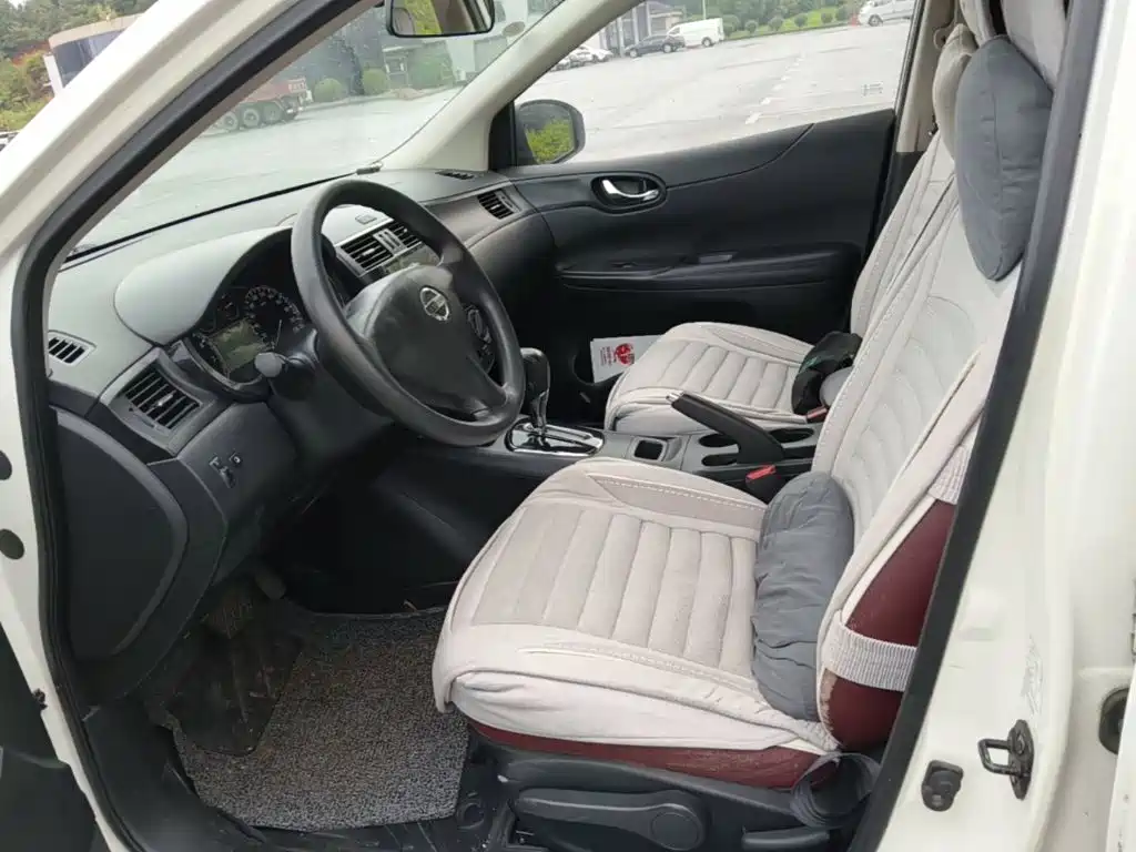 Nissan Tiida 2015 — фото 15