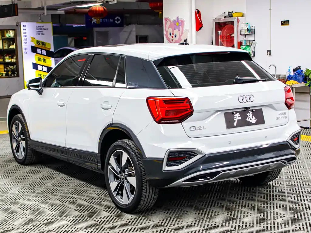 Audi Q2L 2022 — фото 21