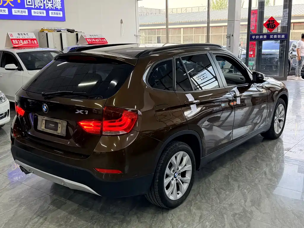 BMW X1 2014 — фото 9