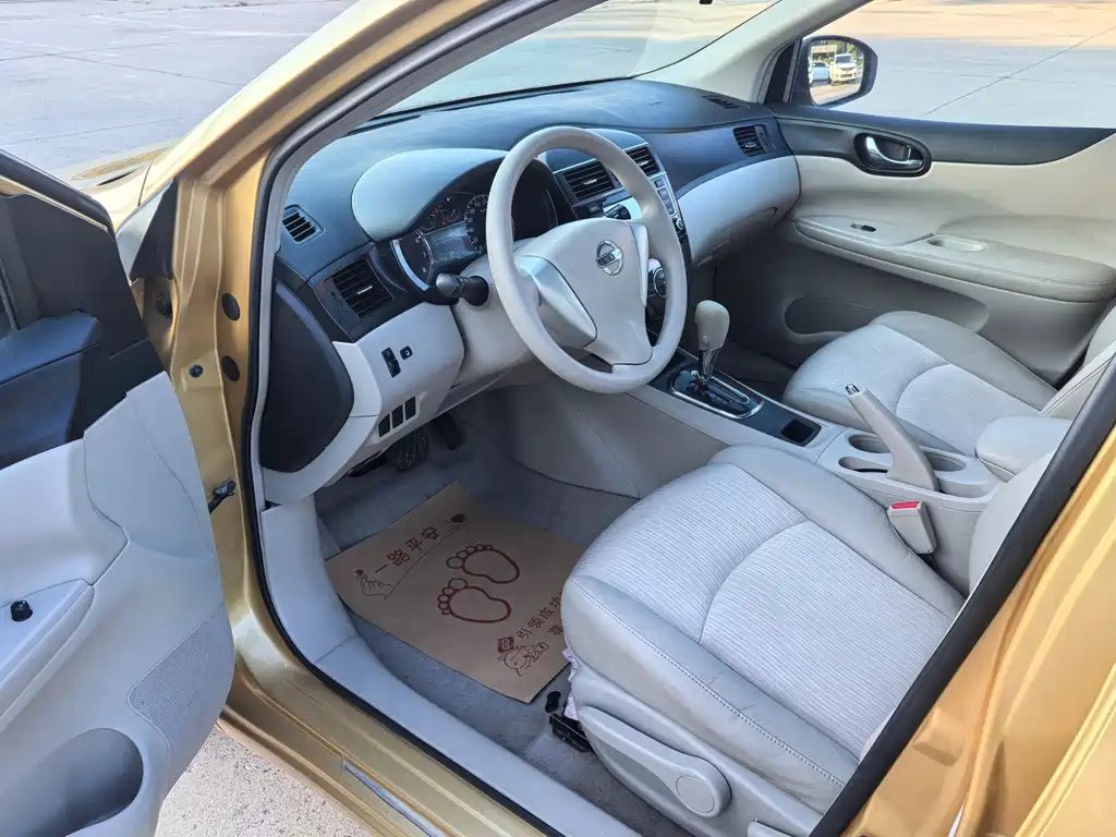 Nissan Tiida 2015 — фото 10