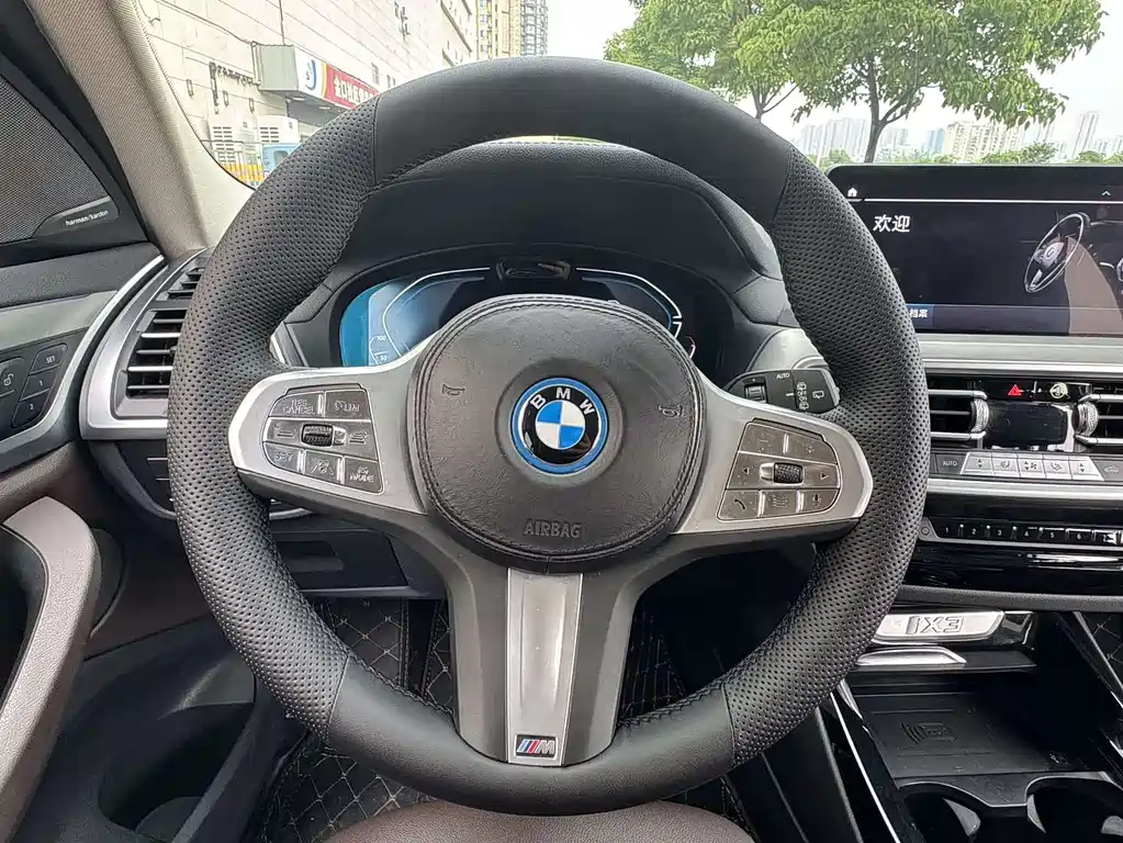 BMW iX3 2023 — фото 11