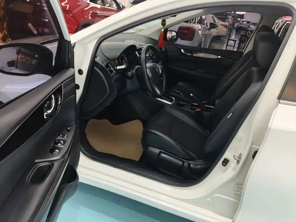 Nissan Tiida 2019 — фото 16