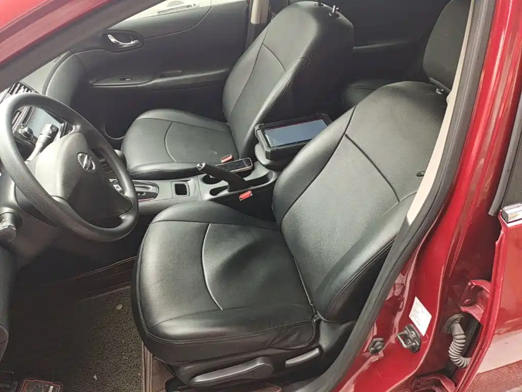 Nissan Tiida 2015 — фото 15