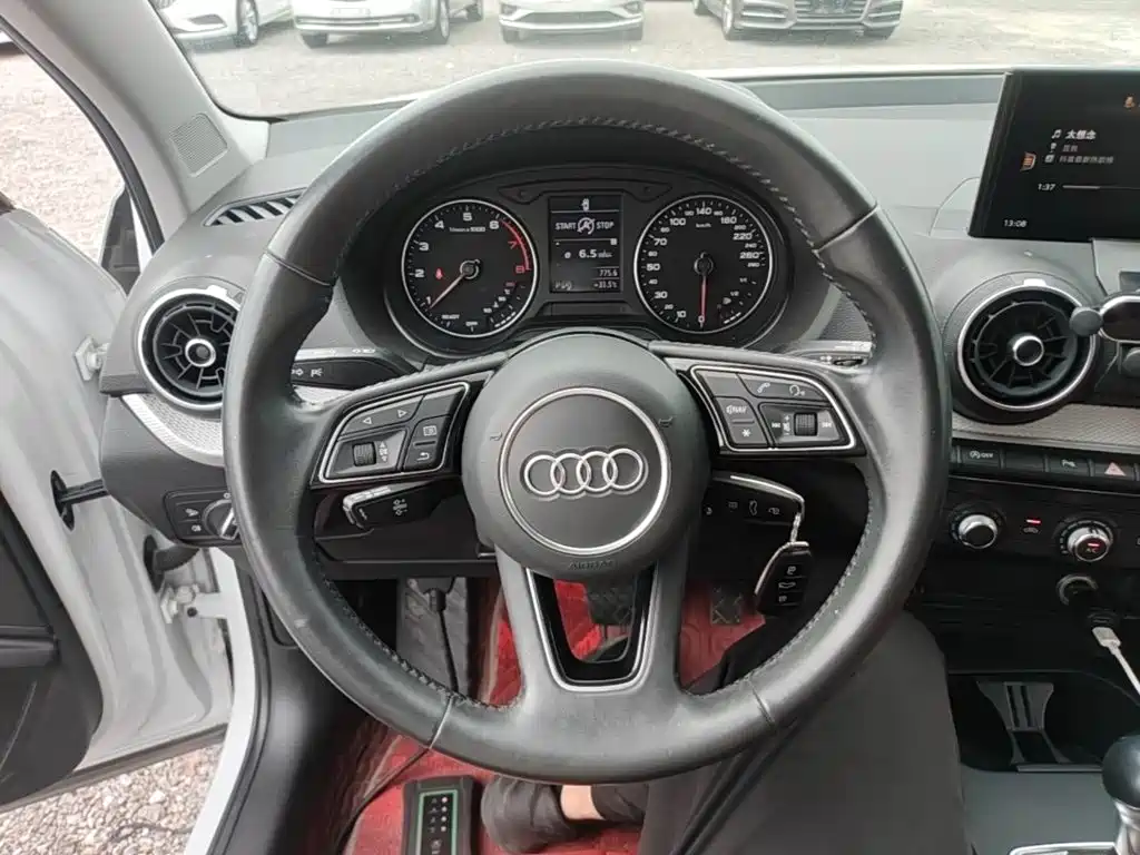 Audi Q2L 2021 — фото 11