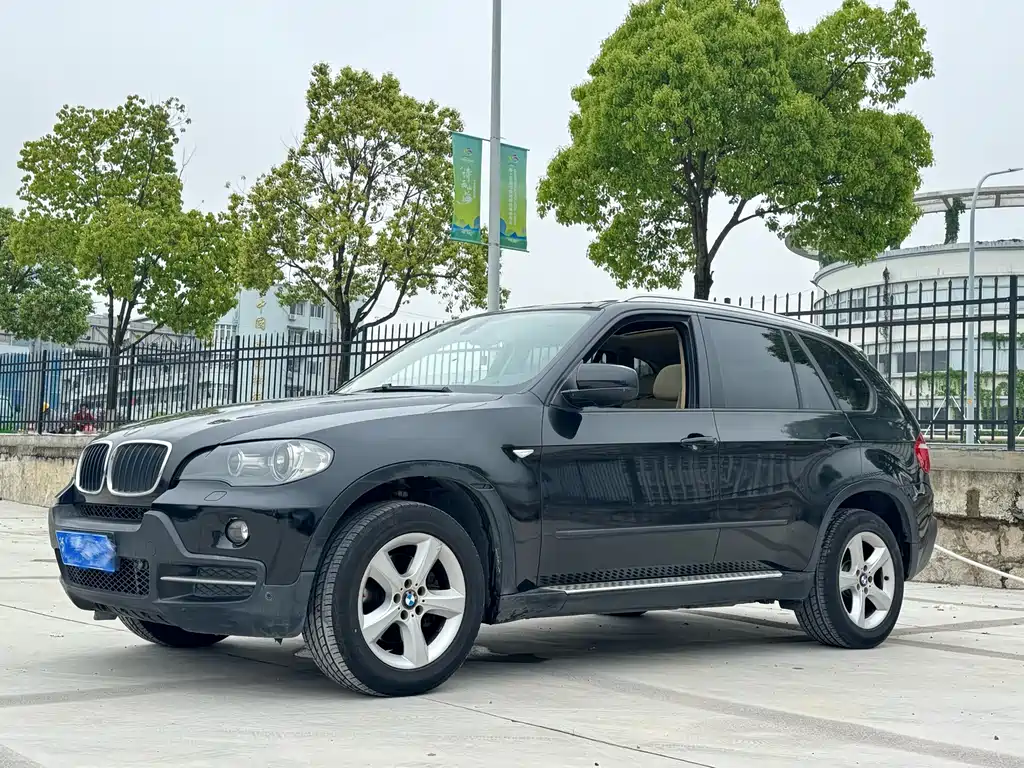 BMW X5 2009 — фото 2