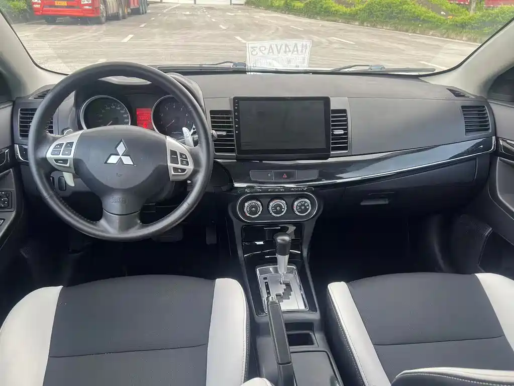 Mitsubishi Lancer EX 2014 — фото 11