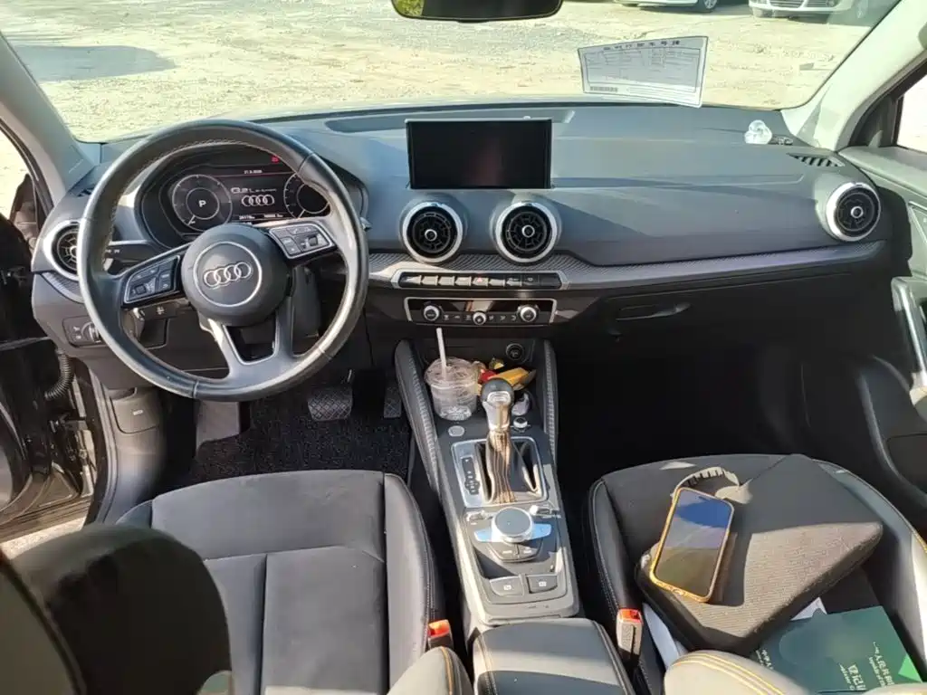 Audi Q2L E-Tron 2023 — фото 10