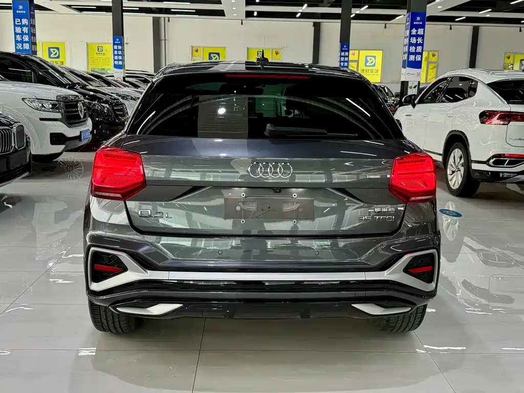 Audi Q2L 2023 — фото 11