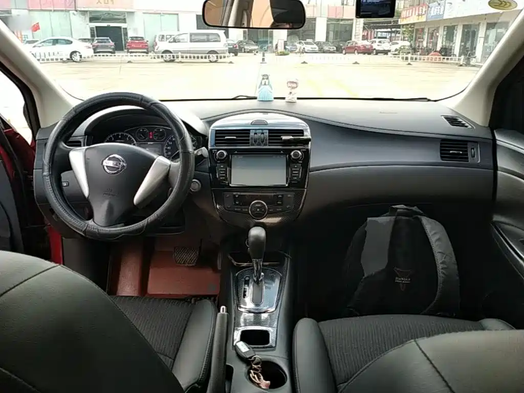 Nissan Tiida 2015 — фото 10