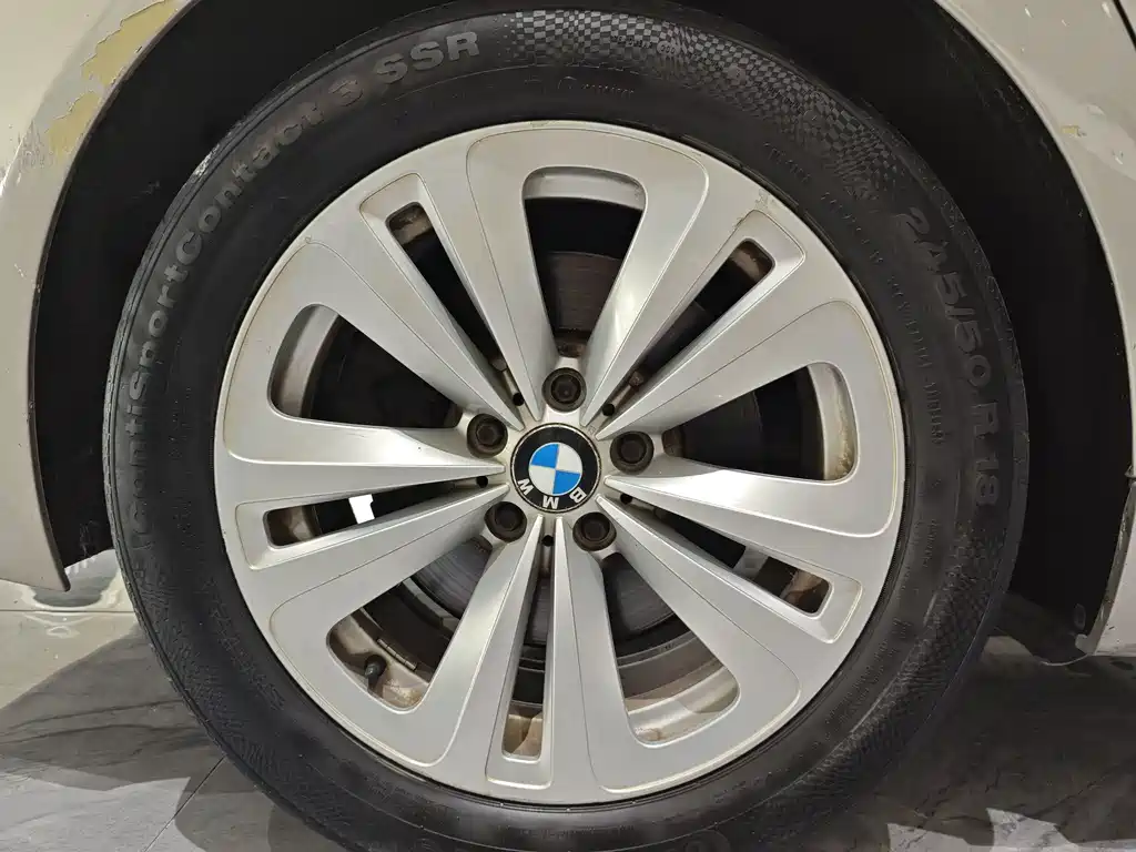 BMW 7 Series 2010 — фото 11