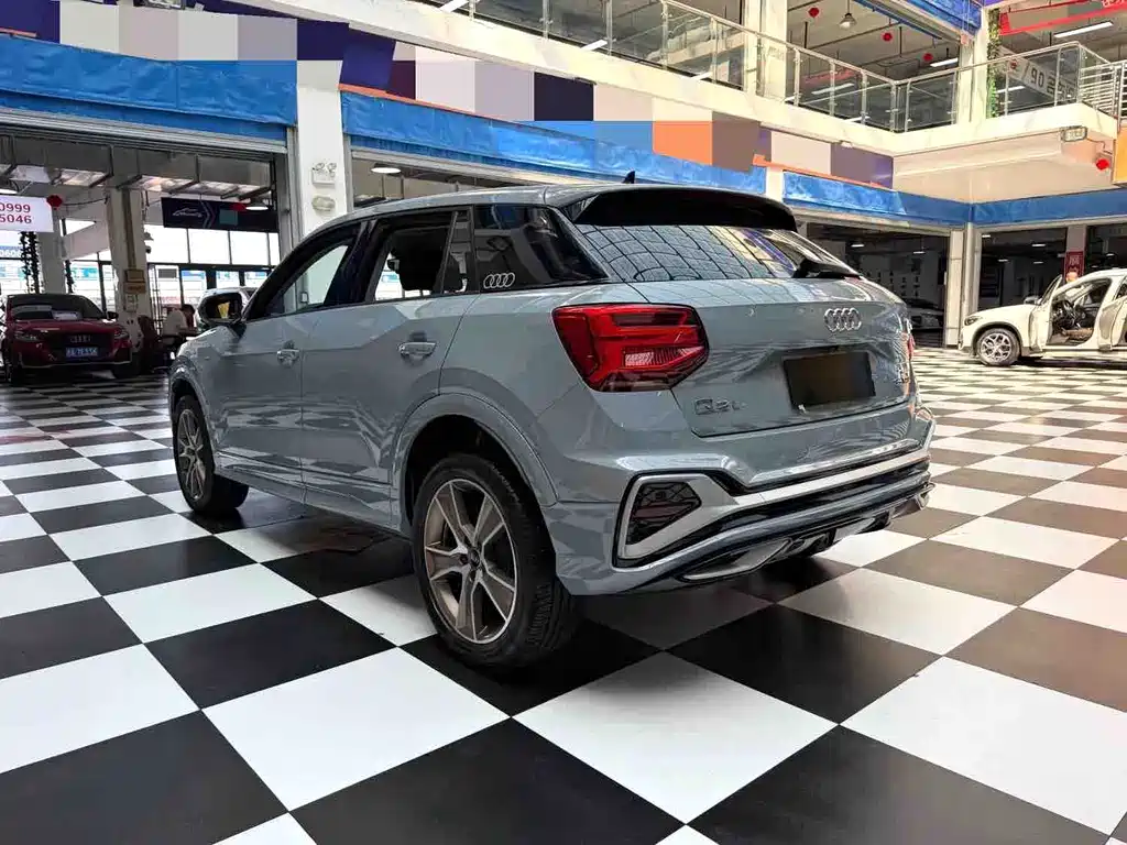 Audi Q2L 2023 — фото 17